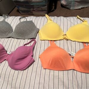 Victoria's Secret Gray, Yellow, Pink, and Orange Bras